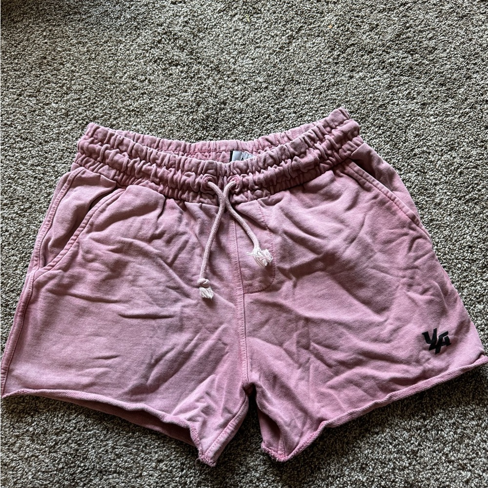 Men’s size large shorts. Pinkish color